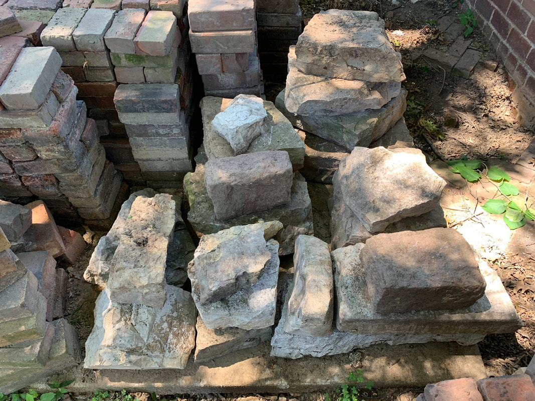 piles of limestone and brick