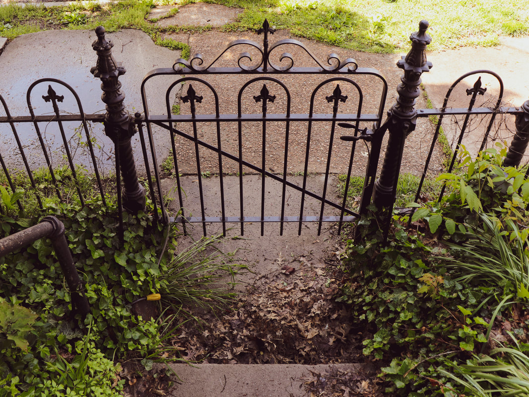 Cast iron fence gate
